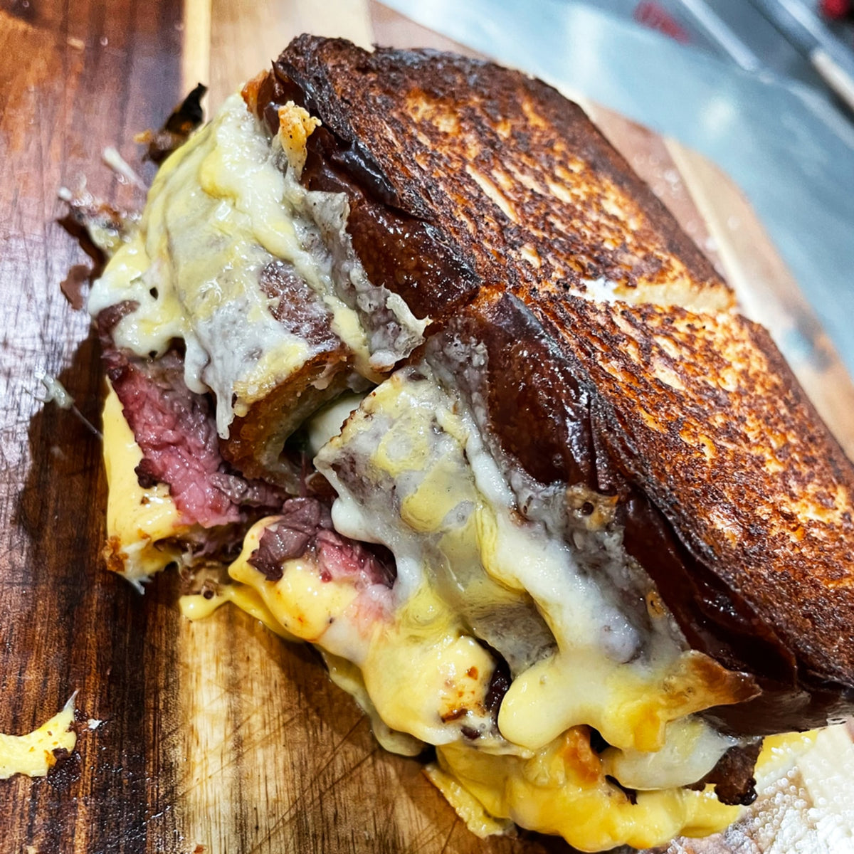 Image of chile relleno cheesesteak on cutting board