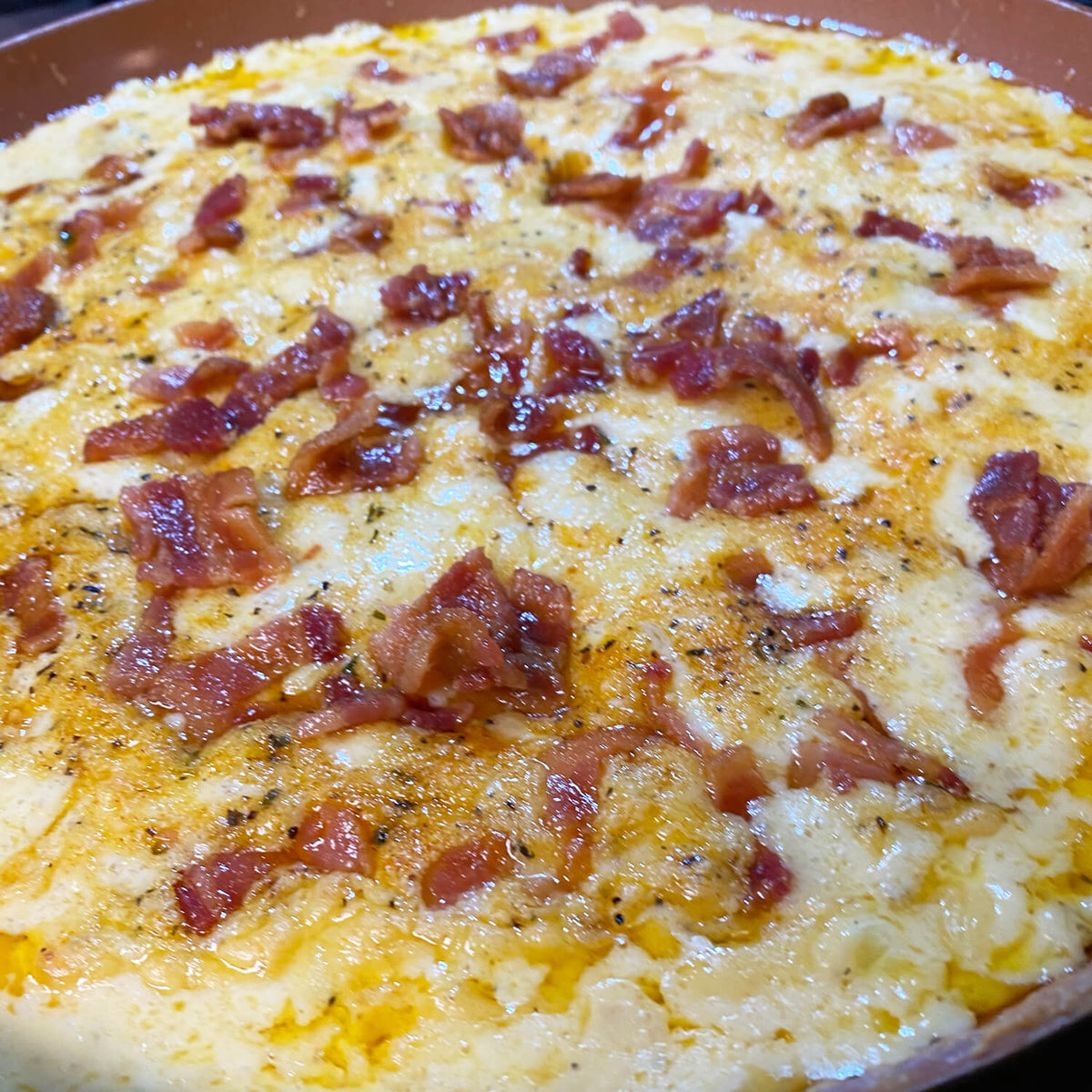 White Cheddar and Bacon Corn Dip in skillet