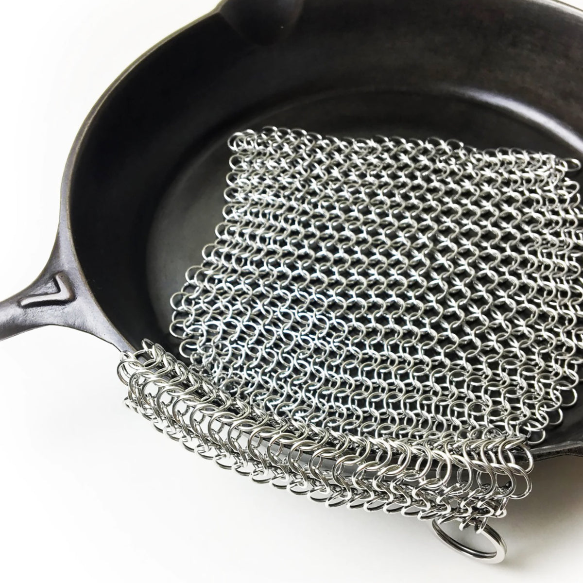 Chain Cirsbee Scrubber on Cast iron Skillet